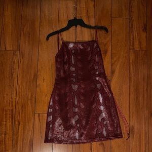 Urban Outfitters Mini dress. Red snakeskin print. Low back with ties.